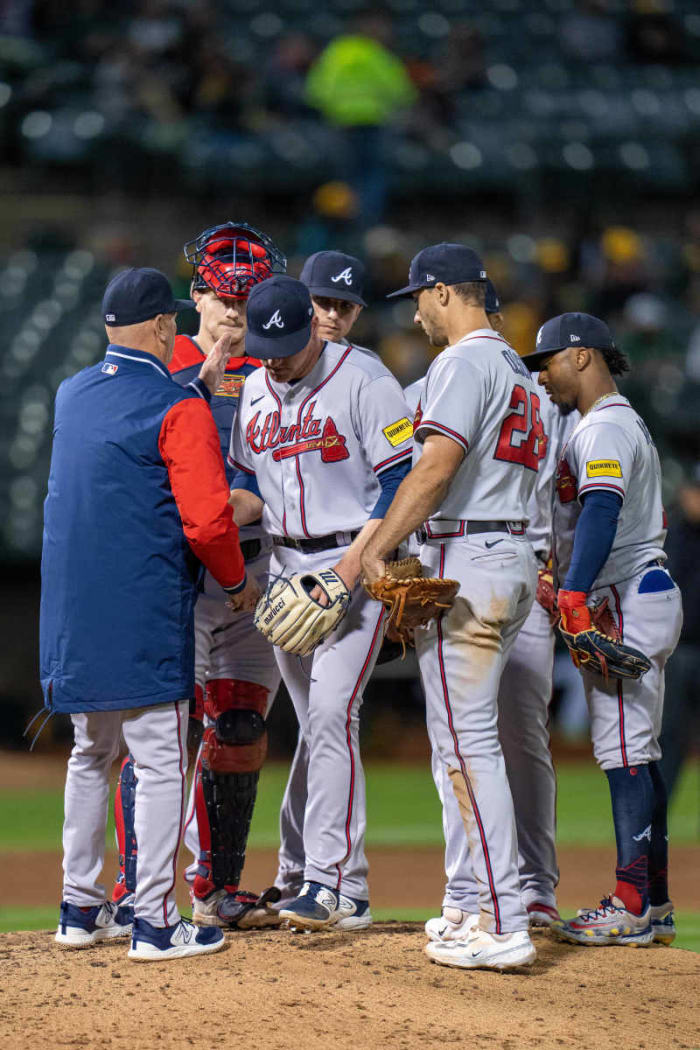 May 30, 2023; Oakland, California, USA; Atlanta Braves manager Brian Snitker (43) relieves starting pitcher Bryce Elder (55) during the eighth inning at Oakland-Alameda County Coliseum.